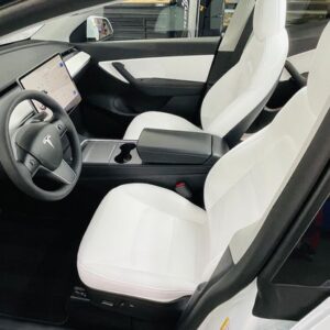 White leather interior of a White Tesla Model Y protected by ceramic coating