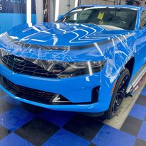 Blue Camaro with professional auto detailing and PPF