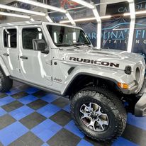 Silver Jeep Rubicon with paint correct, professional detailing, and ceramic coating protection