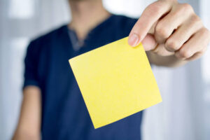 A yellow post-it note