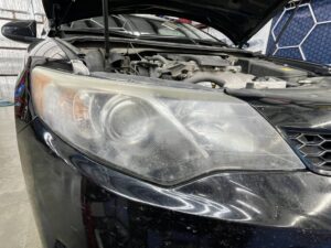 Toyota Camry headlight restoration process: before sanding