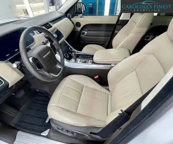 view of a detailed luxury car interior displaying pristine